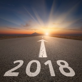 Image of an empty highway with 2018 and an arrow written on it.