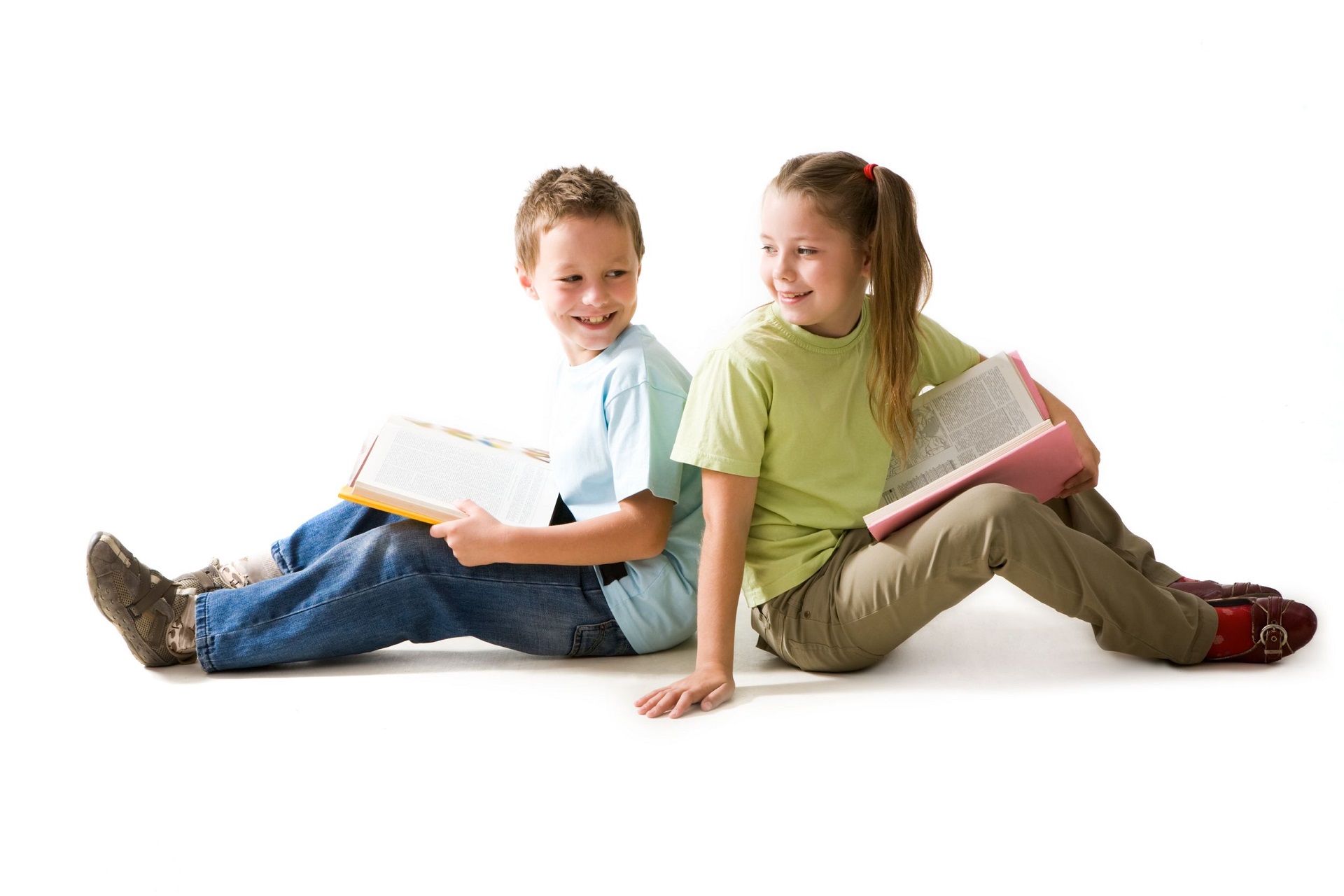 An image of two children reading books